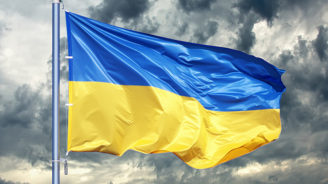 Ukraine flag. Ukrainian flag on black storm cloud sky. stormy weather